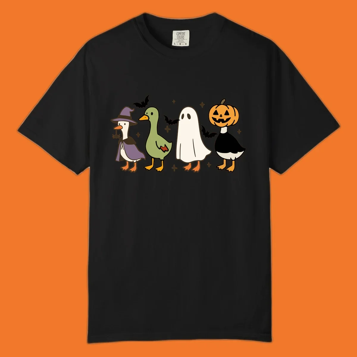 Illustration of four cute animals in Halloween costumes: a witch goose, a duckling, a ghost, and a pumpkin goose.