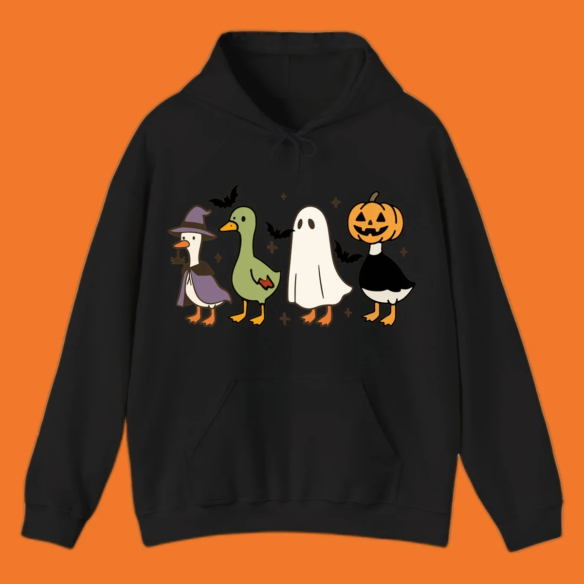 Illustration of four cute animals in Halloween costumes: a witch goose, a duckling, a ghost, and a pumpkin goose.