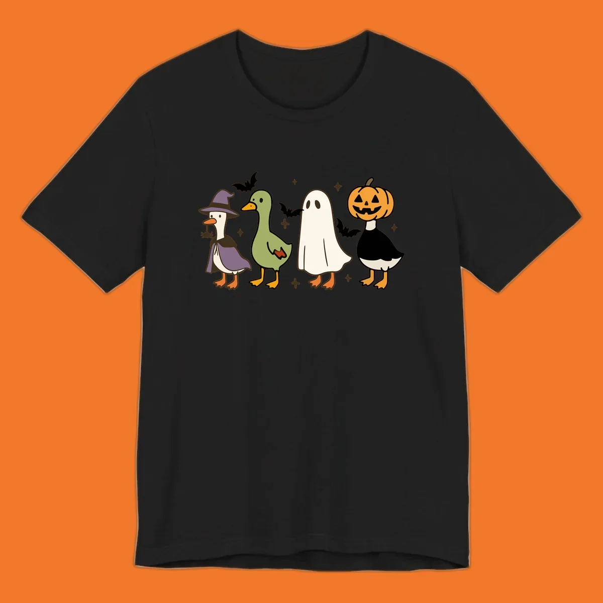 Illustration of four cute animals in Halloween costumes: a witch goose, a duckling, a ghost, and a pumpkin goose.