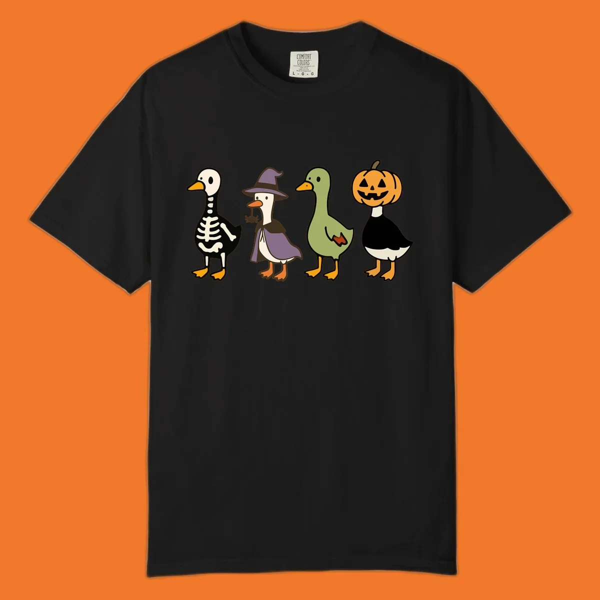 Four ducks in Halloween costumes: skeleton, witch, plain, and jack-o-lantern. Funny Halloween duck costumes.