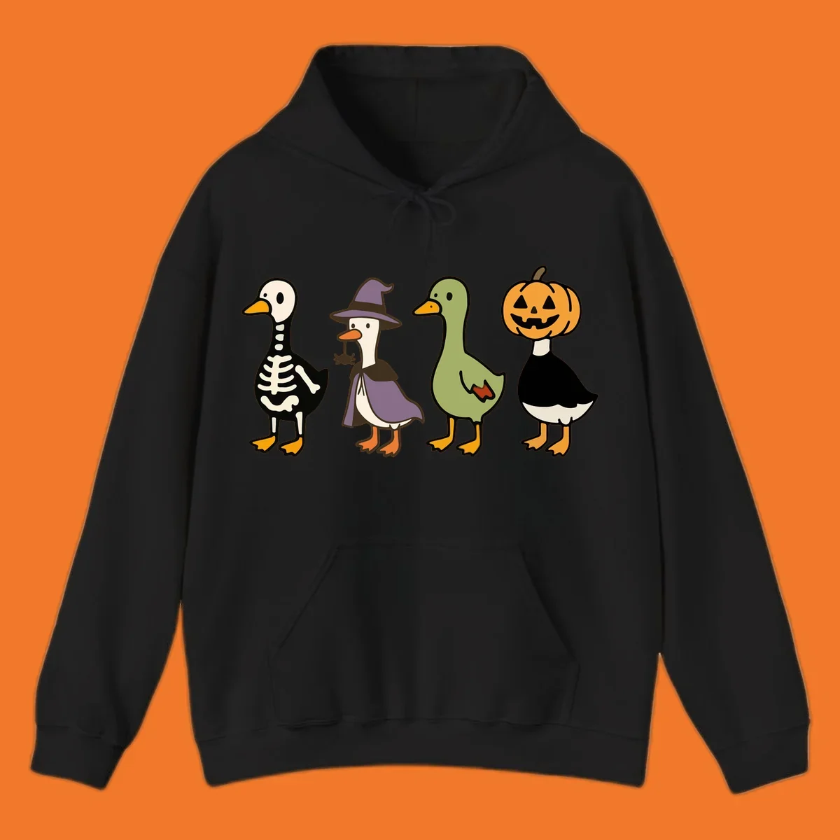 Four ducks in Halloween costumes: skeleton, witch, plain, and jack-o-lantern. Funny Halloween duck costumes.