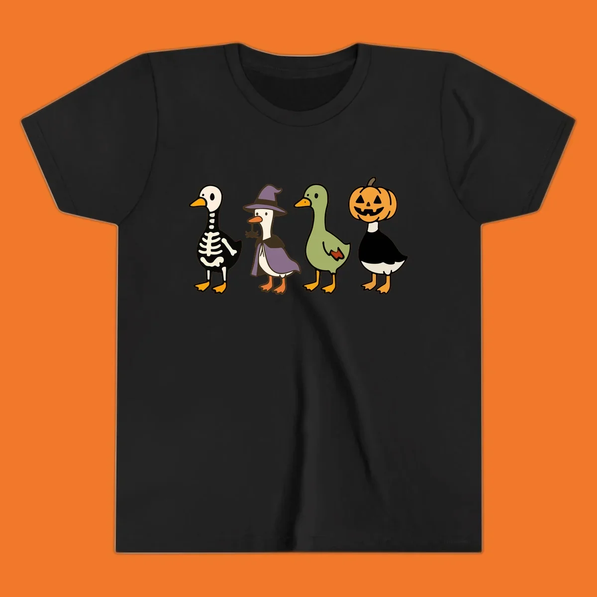 Four ducks in Halloween costumes: skeleton, witch, plain, and jack-o-lantern. Funny Halloween duck costumes.