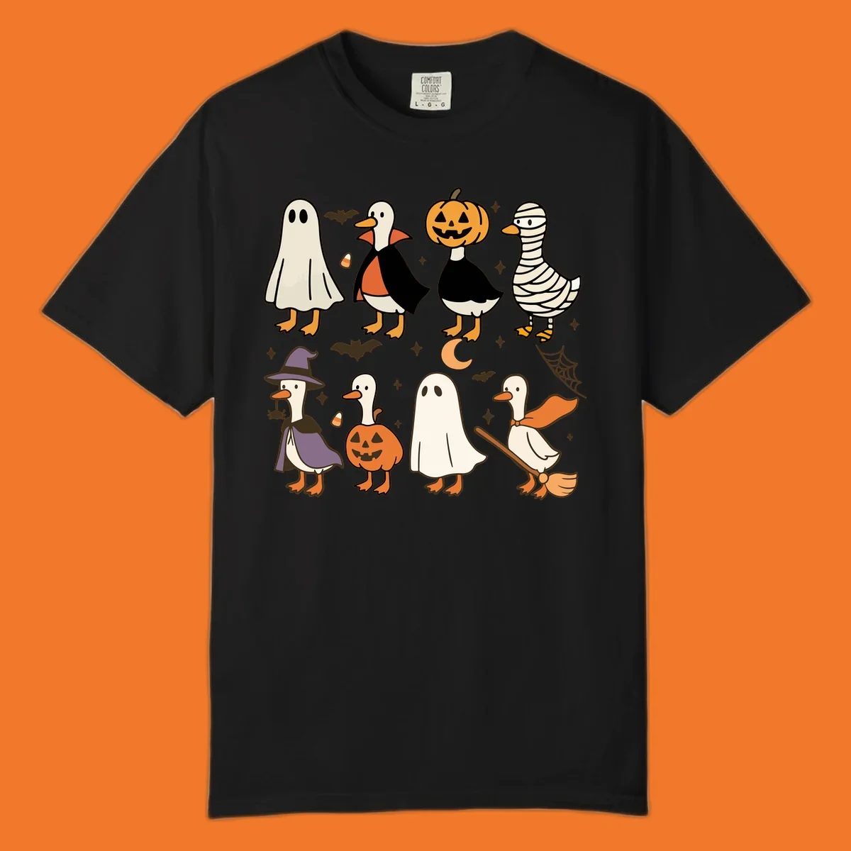 Illustration of cute ducks in various Halloween costumes like ghost, vampire, and pumpkin, on a dark background.