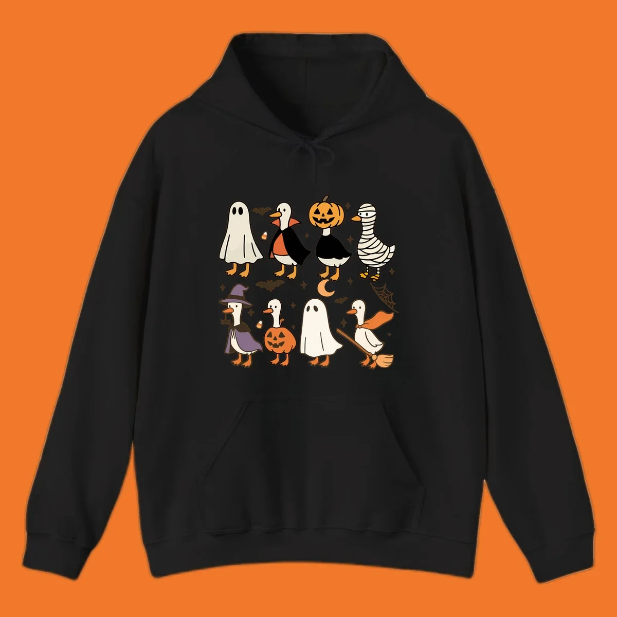 Illustration of cute ducks in various Halloween costumes like ghost, vampire, and pumpkin, on a dark background.
