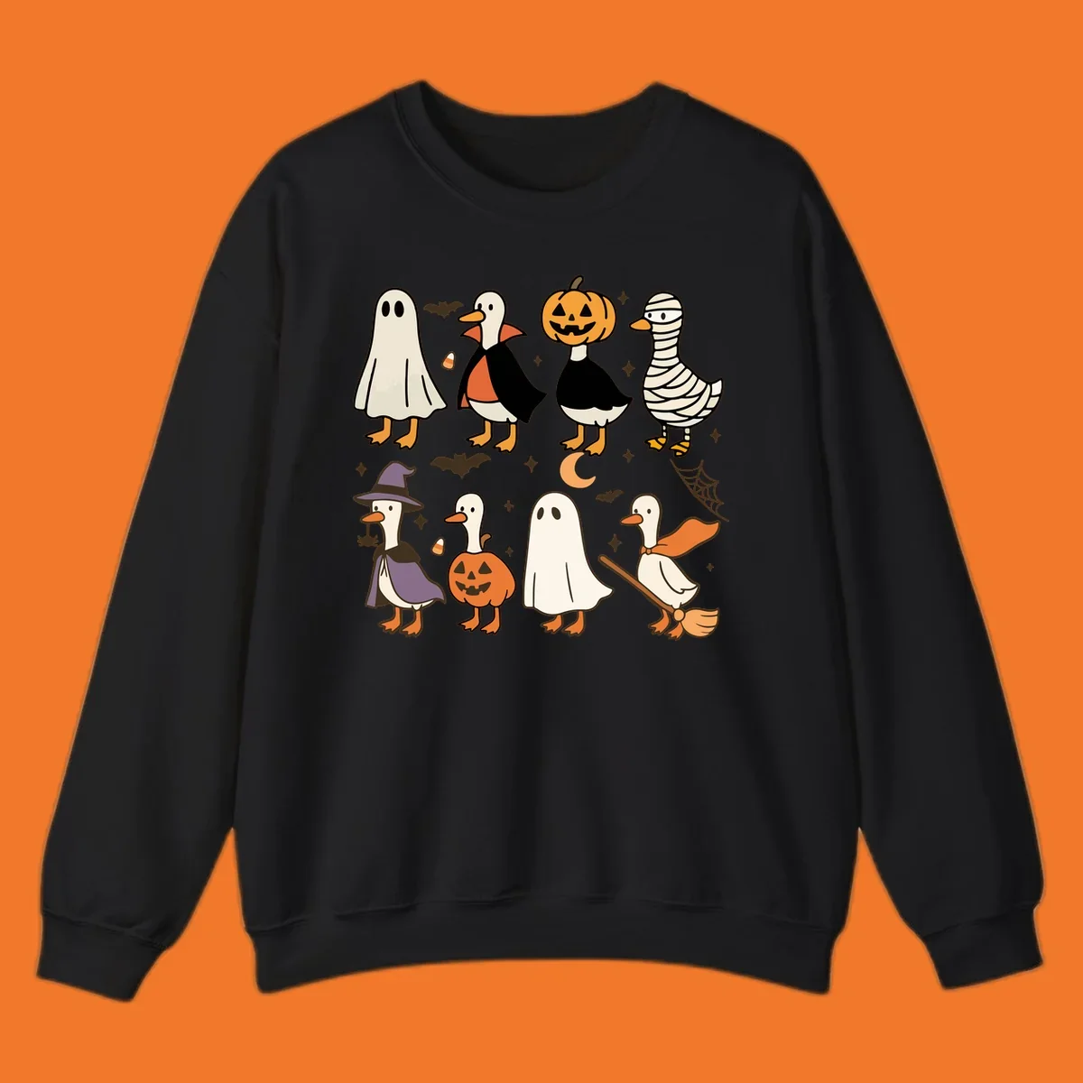 Illustration of cute ducks in various Halloween costumes like ghost, vampire, and pumpkin, on a dark background.
