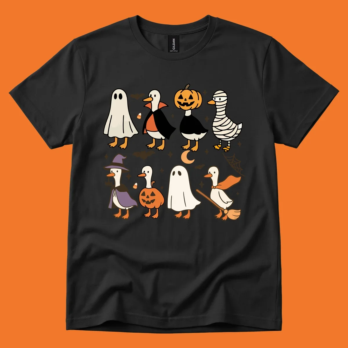 Illustration of cute ducks in various Halloween costumes like ghost, vampire, and pumpkin, on a dark background.
