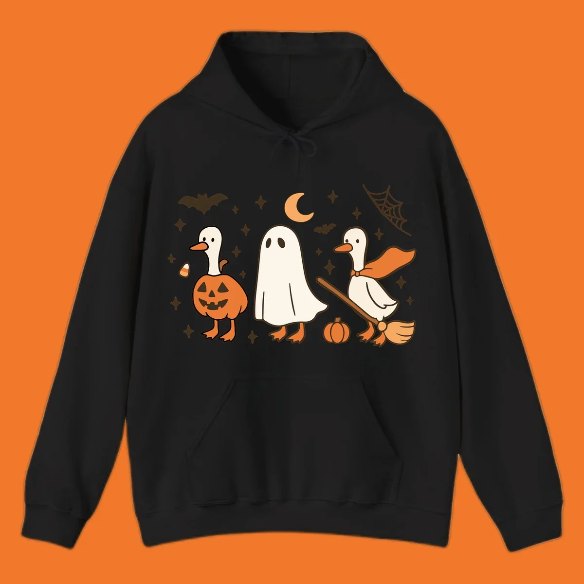 Cute geese in Halloween costumes: pumpkin, ghost, and witch on broom, with bats and stars.
