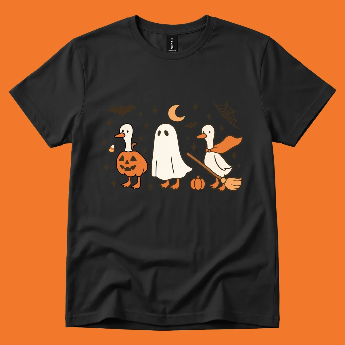 Cute geese in Halloween costumes: pumpkin, ghost, and witch on broom, with bats and stars.