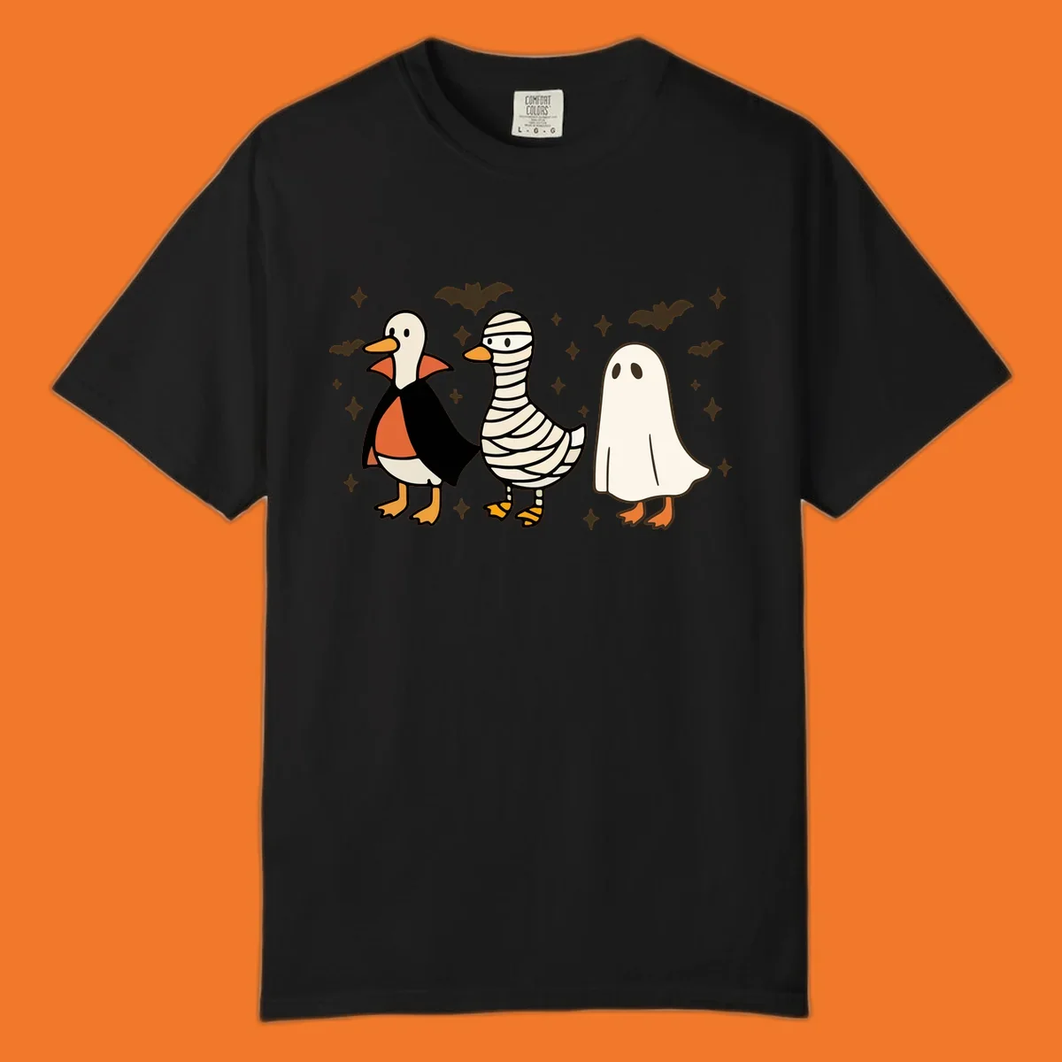 Halloween duck trio in costumes: vampire, mummy, and ghost. holiday-duck-trio.