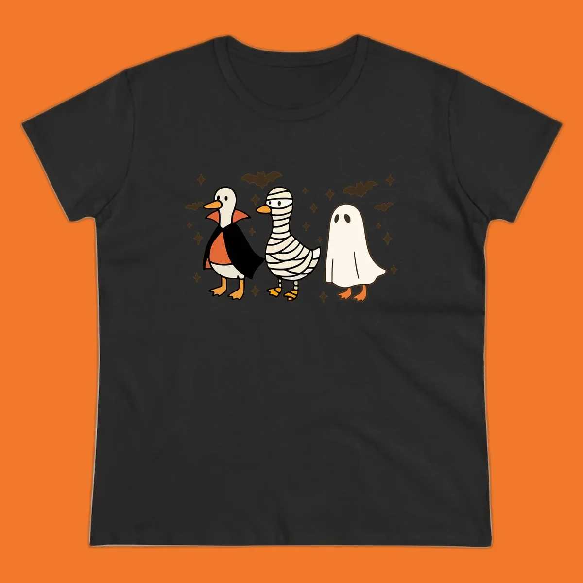 Halloween duck trio in costumes: vampire, mummy, and ghost. holiday-duck-trio.