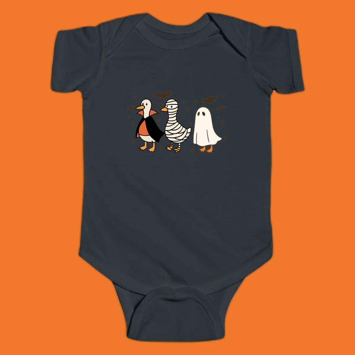 Halloween duck trio in costumes: vampire, mummy, and ghost. holiday-duck-trio.