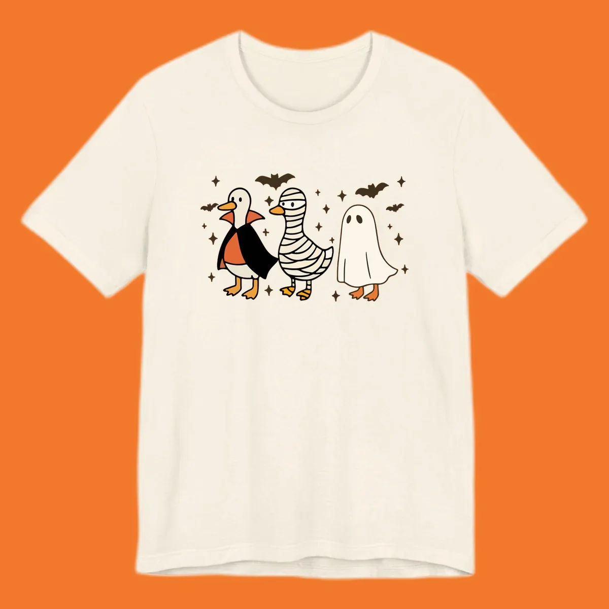 Halloween duck trio in costumes: vampire, mummy, and ghost. holiday-duck-trio.