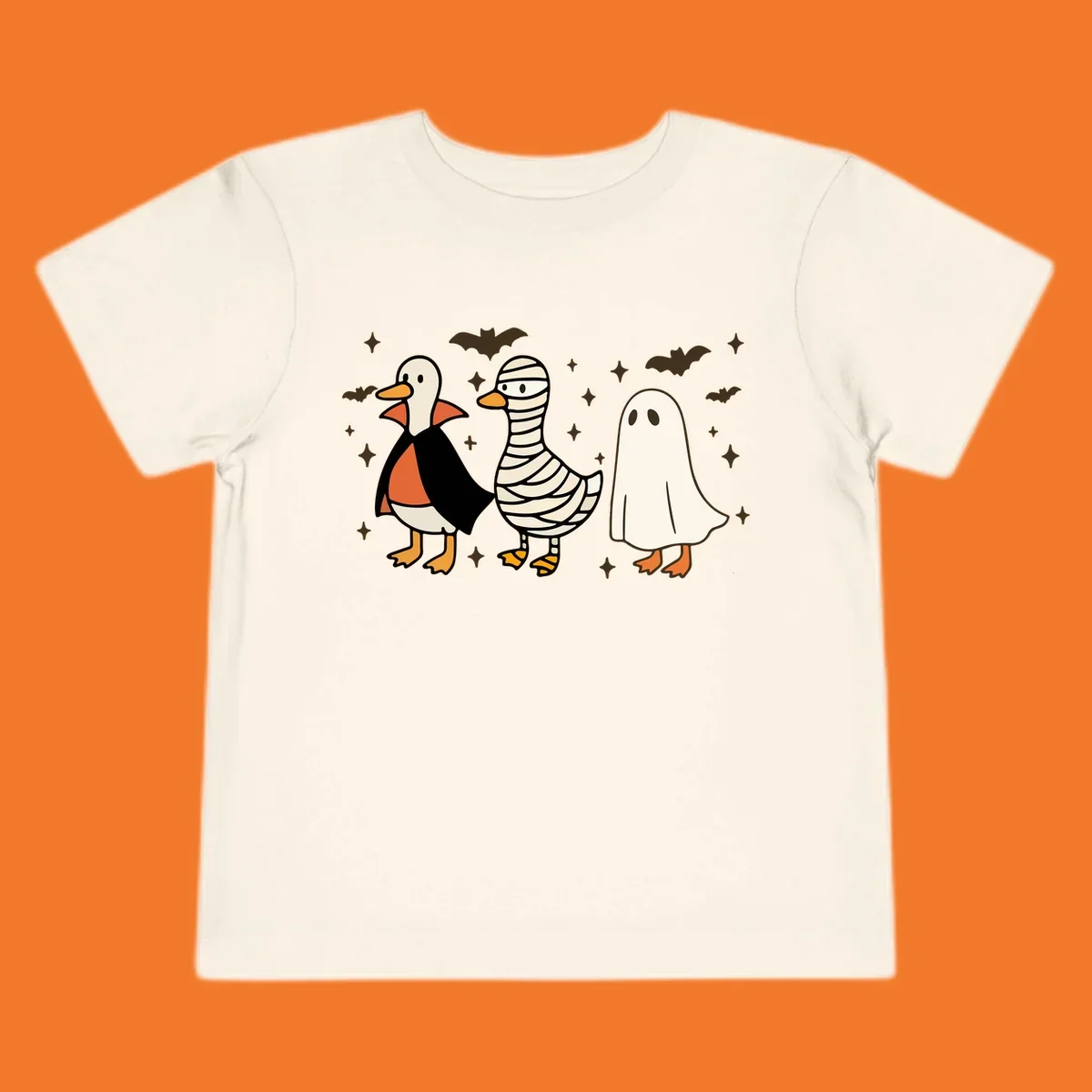 Halloween duck trio in costumes: vampire, mummy, and ghost. holiday-duck-trio.