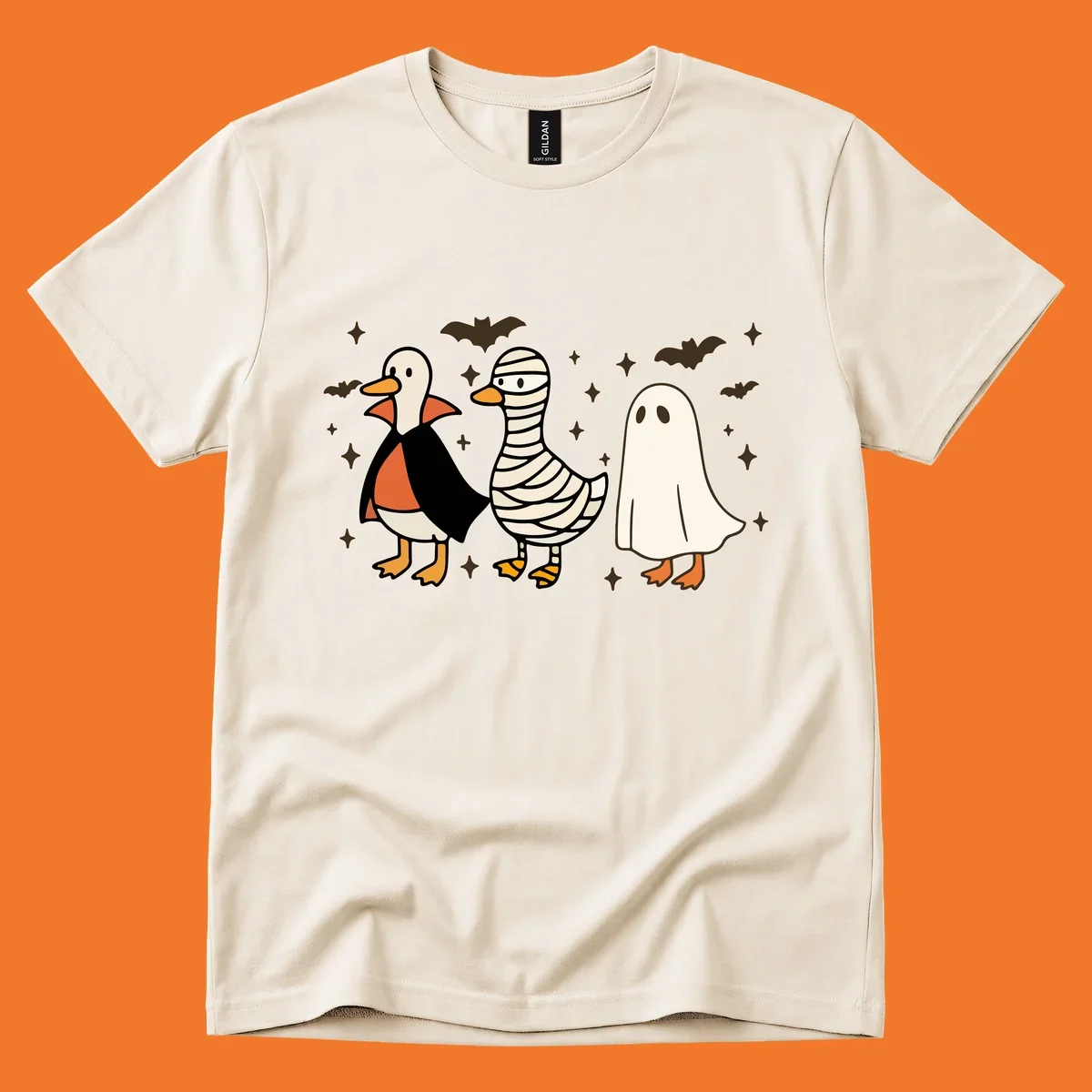 Halloween duck trio in costumes: vampire, mummy, and ghost. holiday-duck-trio.