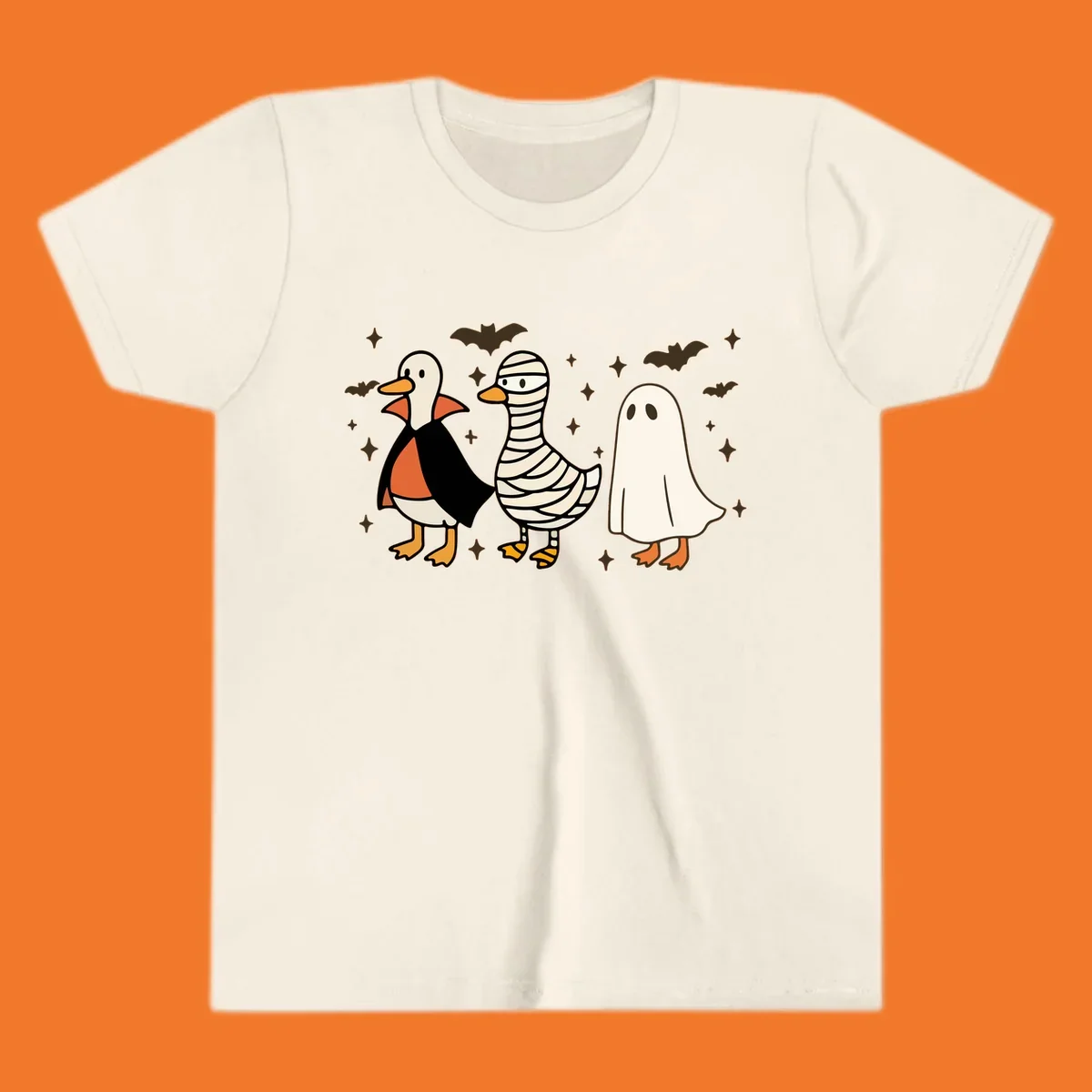 Halloween duck trio in costumes: vampire, mummy, and ghost. holiday-duck-trio.