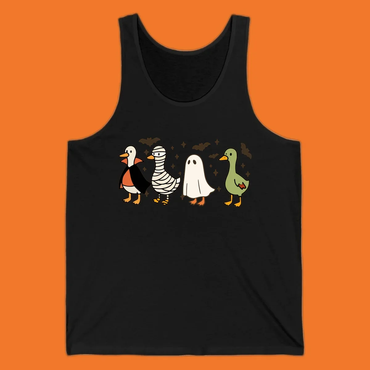 Four cute ducks in Halloween costumes: vampire, mummy, ghost, and plain duck, with bats and stars.