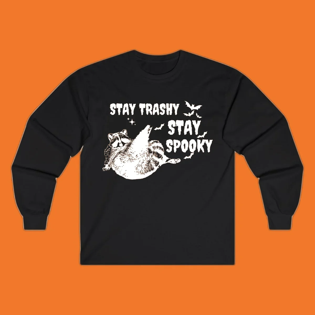 Trashy spooky raccoon illustration with bats and text for Halloween.