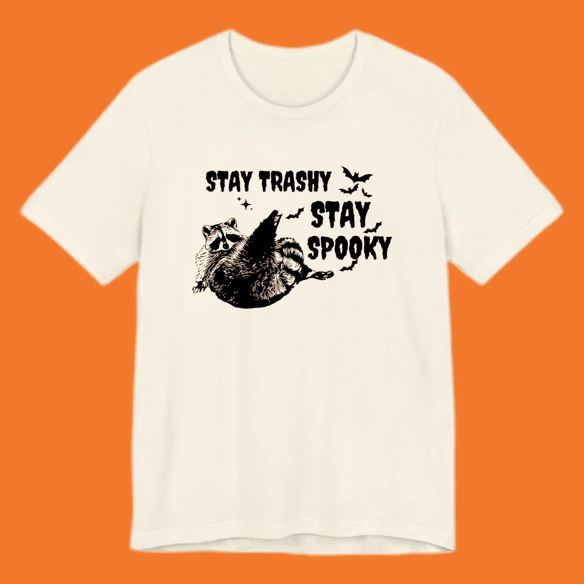 Trashy spooky raccoon illustration with bats and text for Halloween.