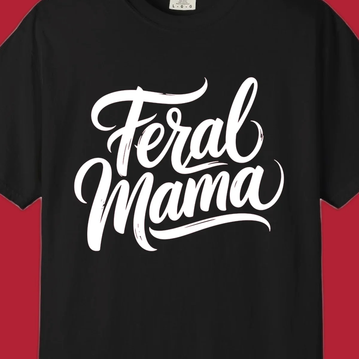 Bold black script text reading 'Feral Mama' with decorative flourishes, highlighting the feral mama script concept.