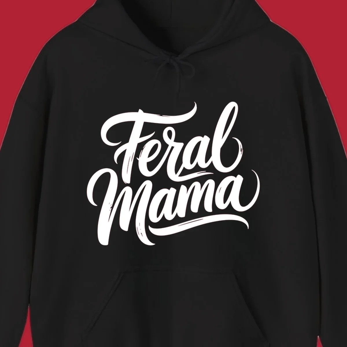 Bold black script text reading 'Feral Mama' with decorative flourishes, highlighting the feral mama script concept.