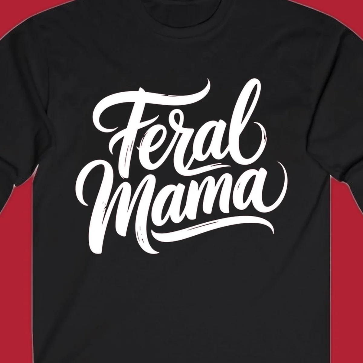 Bold black script text reading 'Feral Mama' with decorative flourishes, highlighting the feral mama script concept.