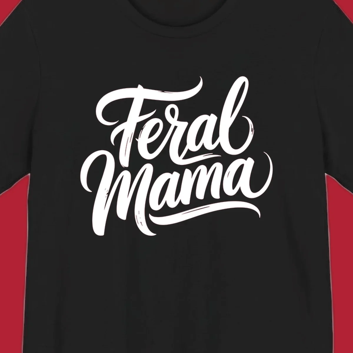 Bold black script text reading 'Feral Mama' with decorative flourishes, highlighting the feral mama script concept.