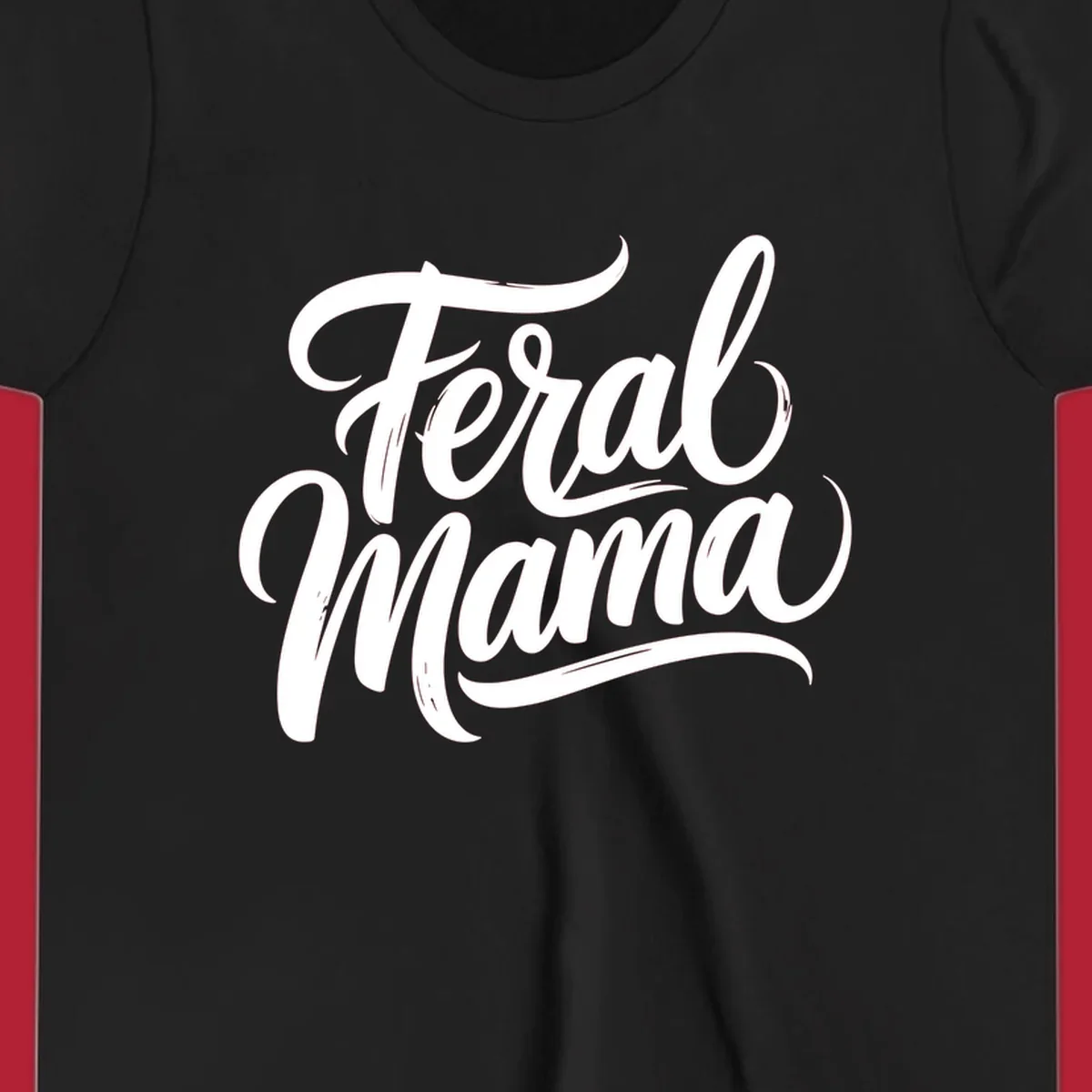 Bold black script text reading 'Feral Mama' with decorative flourishes, highlighting the feral mama script concept.