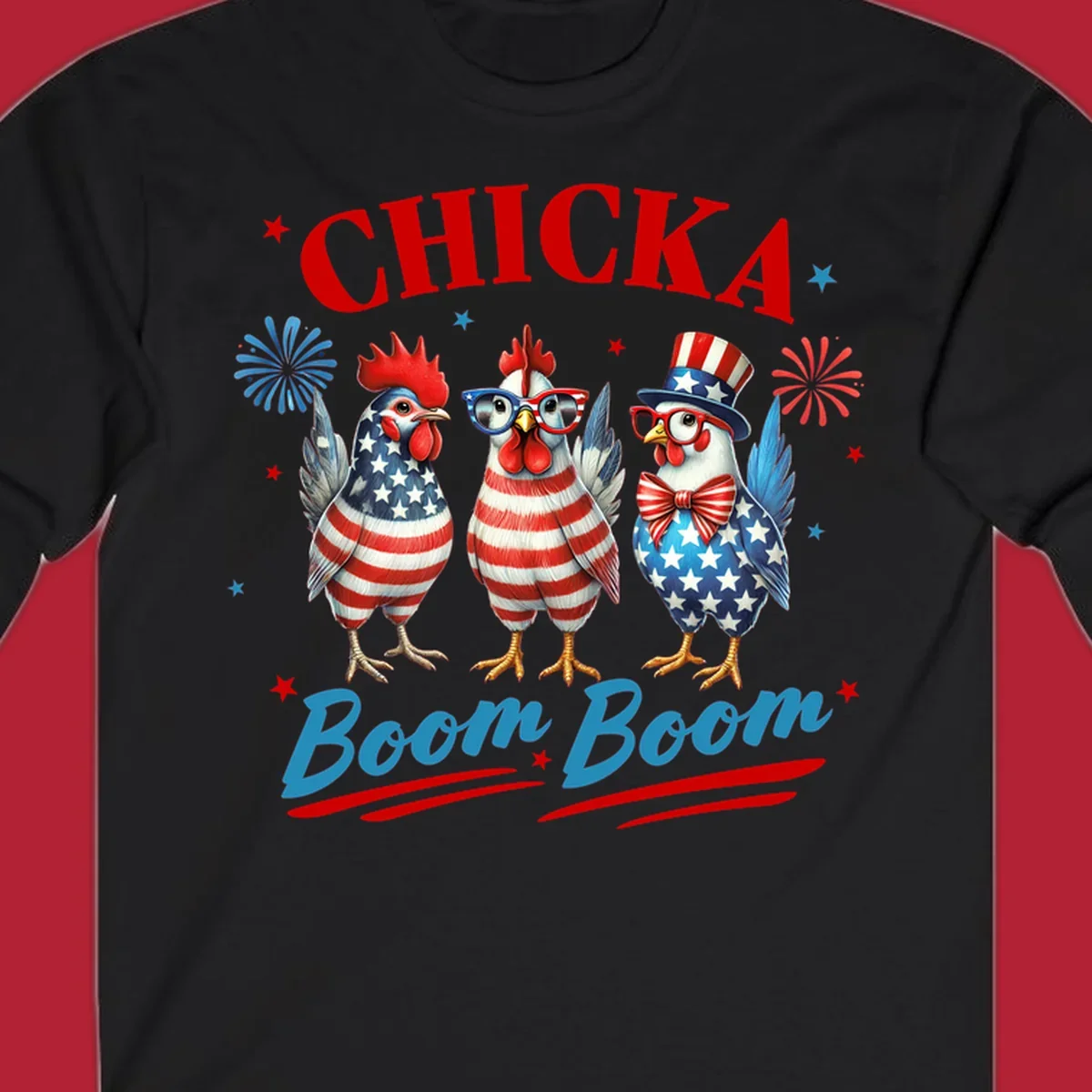 Three patriotic chickens in American flag patterns with fireworks and stars, text reads 'Chicka Boom Boom'. Features the chicka-boom-boom-patriotic-chickens concept.