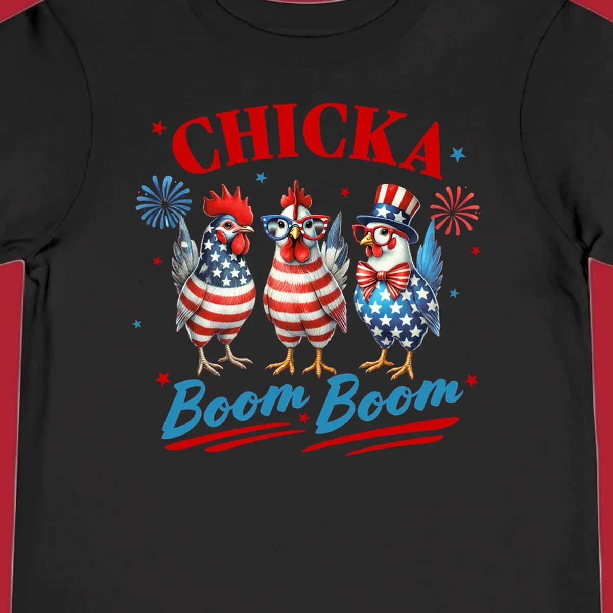 Three patriotic chickens in American flag patterns with fireworks and stars, text reads 'Chicka Boom Boom'. Features the chicka-boom-boom-patriotic-chickens concept.