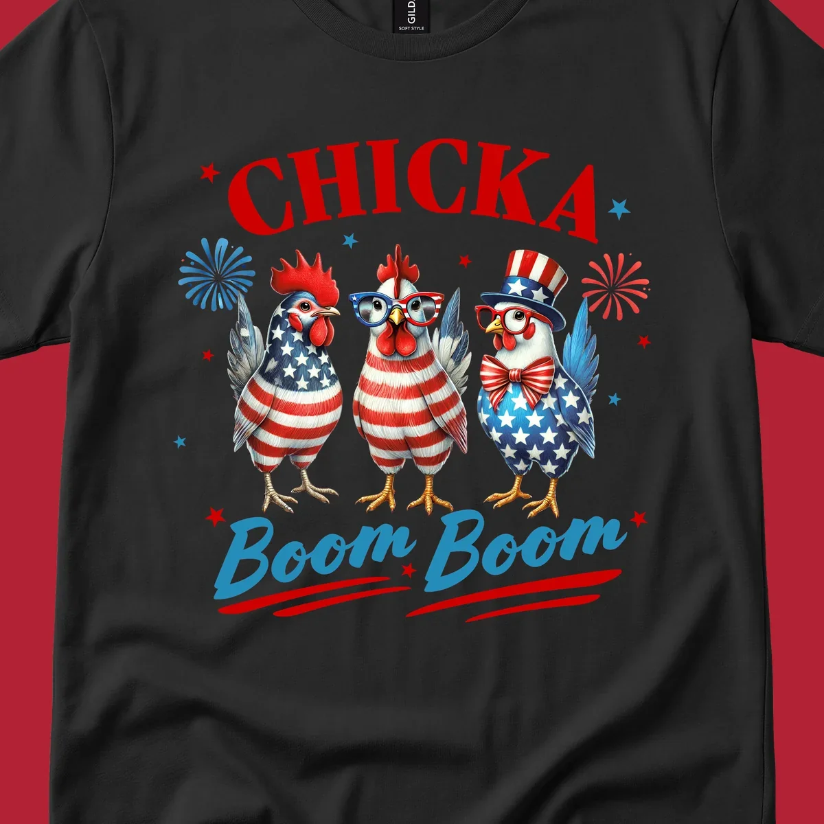 Three patriotic chickens in American flag patterns with fireworks and stars, text reads 'Chicka Boom Boom'. Features the chicka-boom-boom-patriotic-chickens concept.