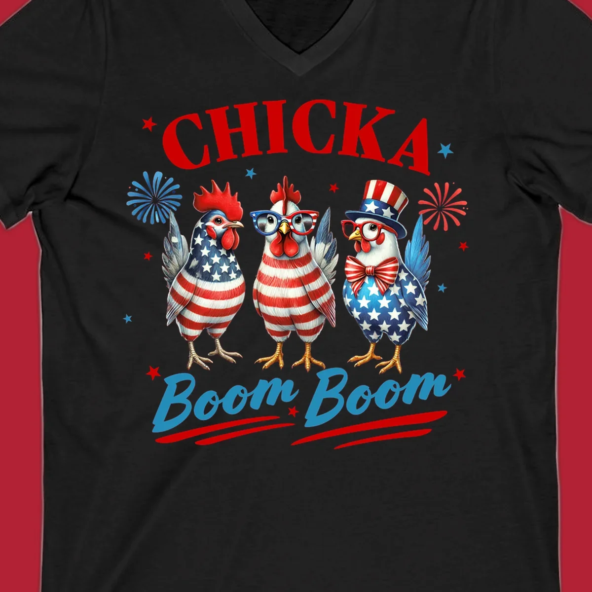 Three patriotic chickens in American flag patterns with fireworks and stars, text reads 'Chicka Boom Boom'. Features the chicka-boom-boom-patriotic-chickens concept.