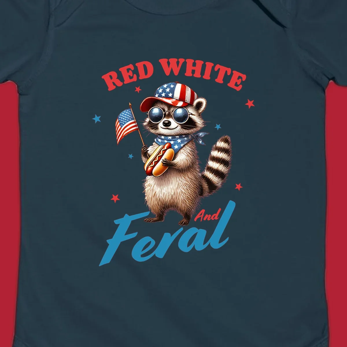 A cartoon raccoon wearing a patriotic hat and bandana, holding an American flag and a hot dog, with 'Red White And Feral' text. This is a red-white-feral-raccoon design.