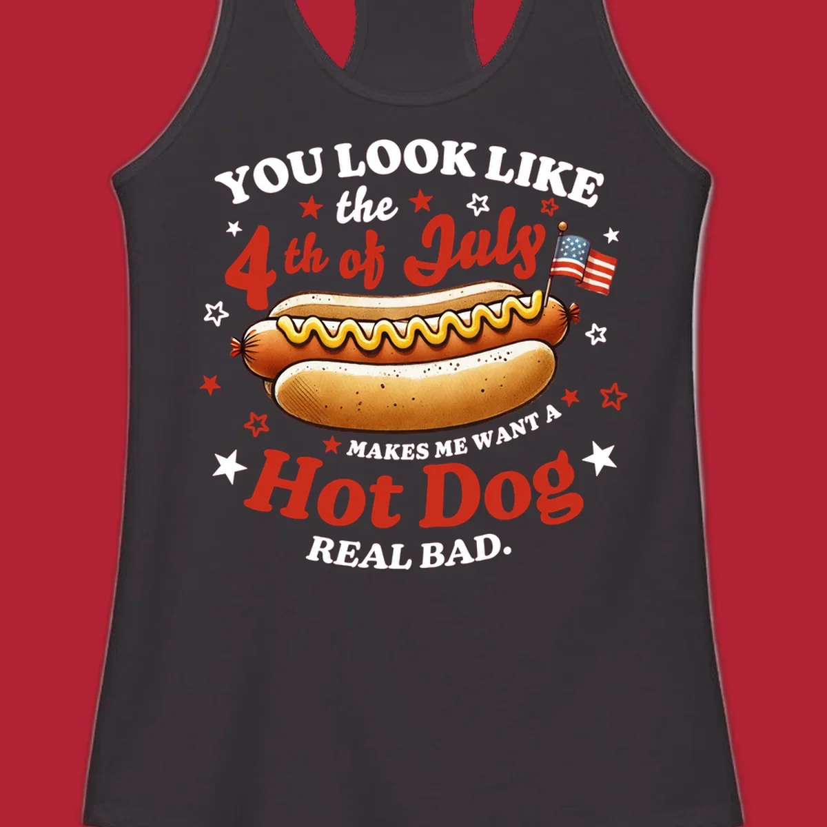 An illustrated hot dog with mustard, American flags, and stars. Text reads "YOU LOOK LIKE the 4th of July MAKES ME WANT A Hot Dog REAL BAD." you-look-like-4th-july design.