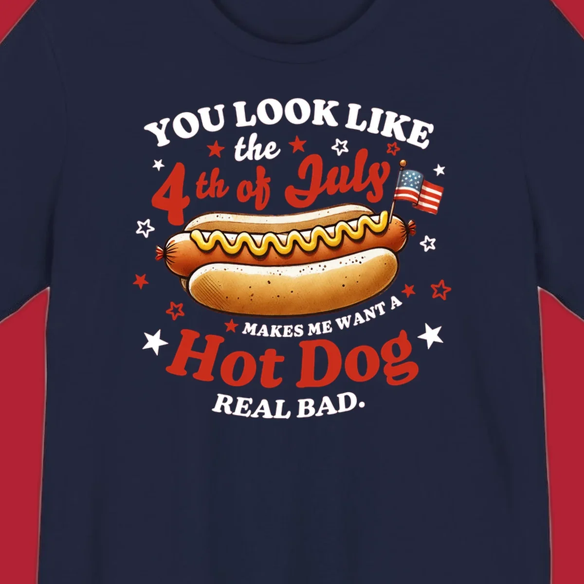An illustrated hot dog with mustard, American flags, and stars. Text reads "YOU LOOK LIKE the 4th of July MAKES ME WANT A Hot Dog REAL BAD." you-look-like-4th-july design.