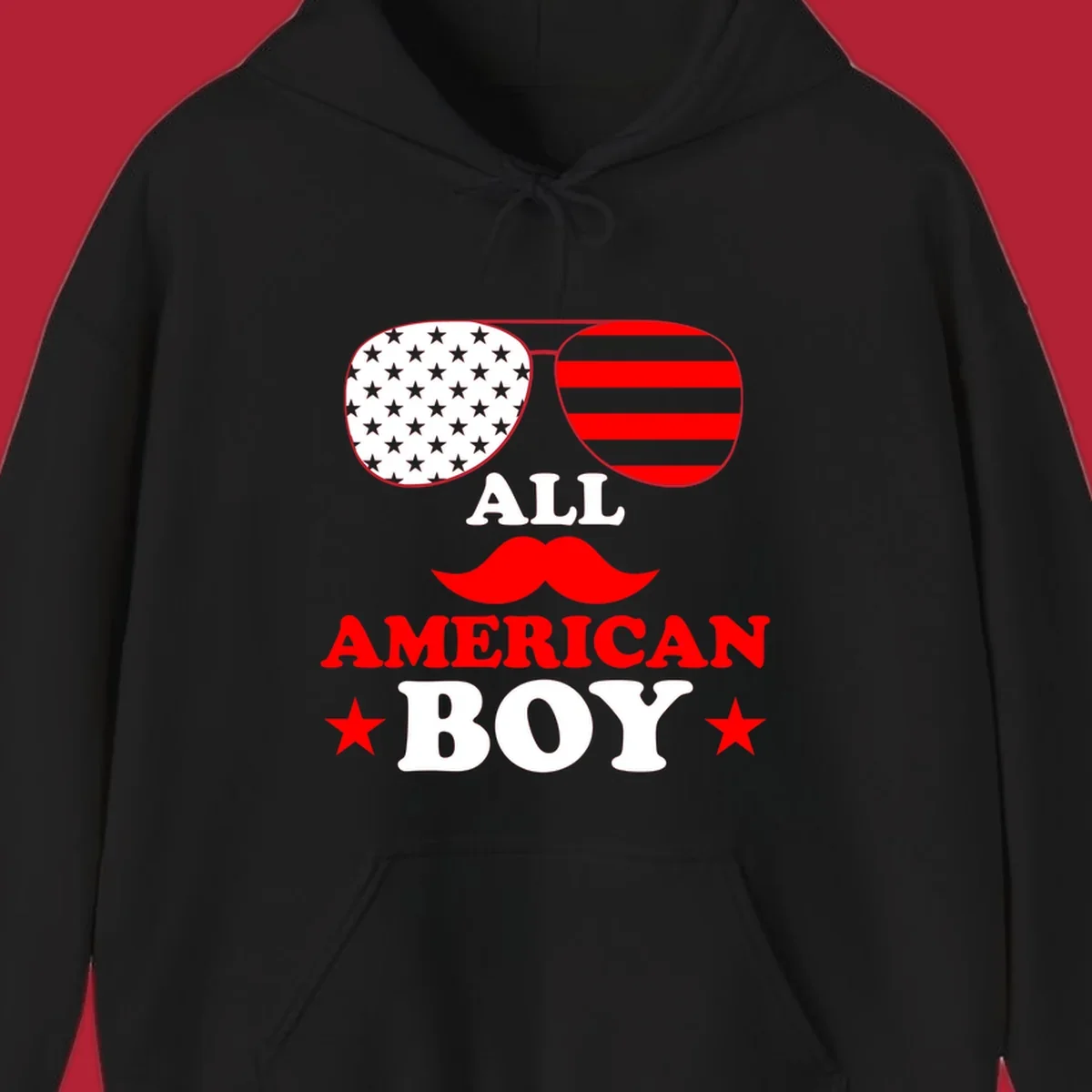 All American Boy patriotic design with aviator sunglasses featuring stars and stripes, a red mustache, and bold text.