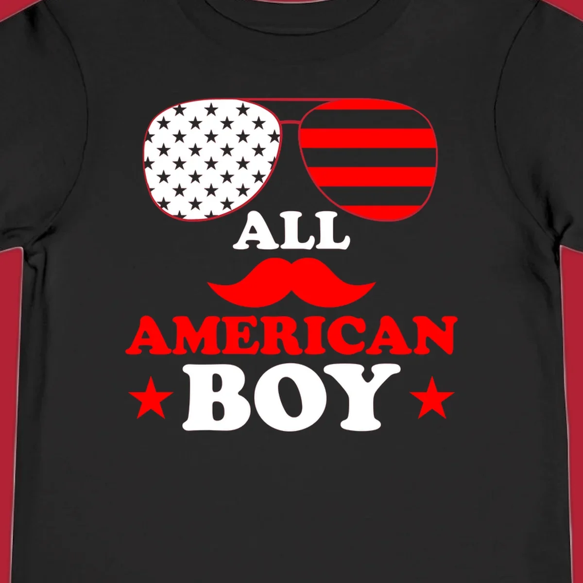 All American Boy patriotic design with aviator sunglasses featuring stars and stripes, a red mustache, and bold text.
