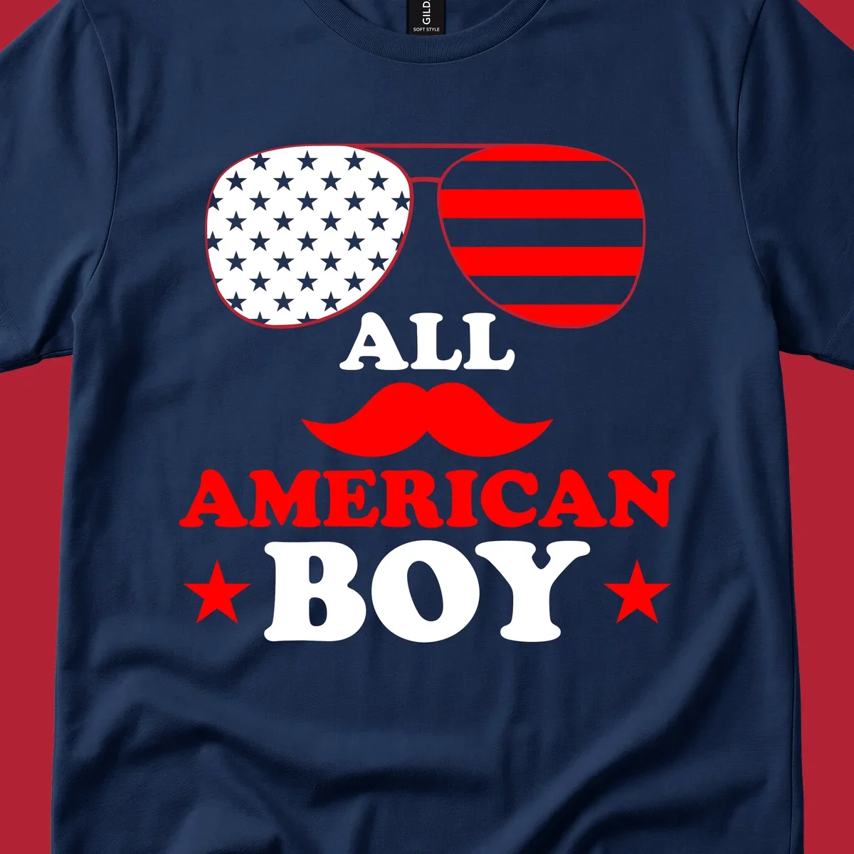 All American Boy patriotic design with aviator sunglasses featuring stars and stripes, a red mustache, and bold text.