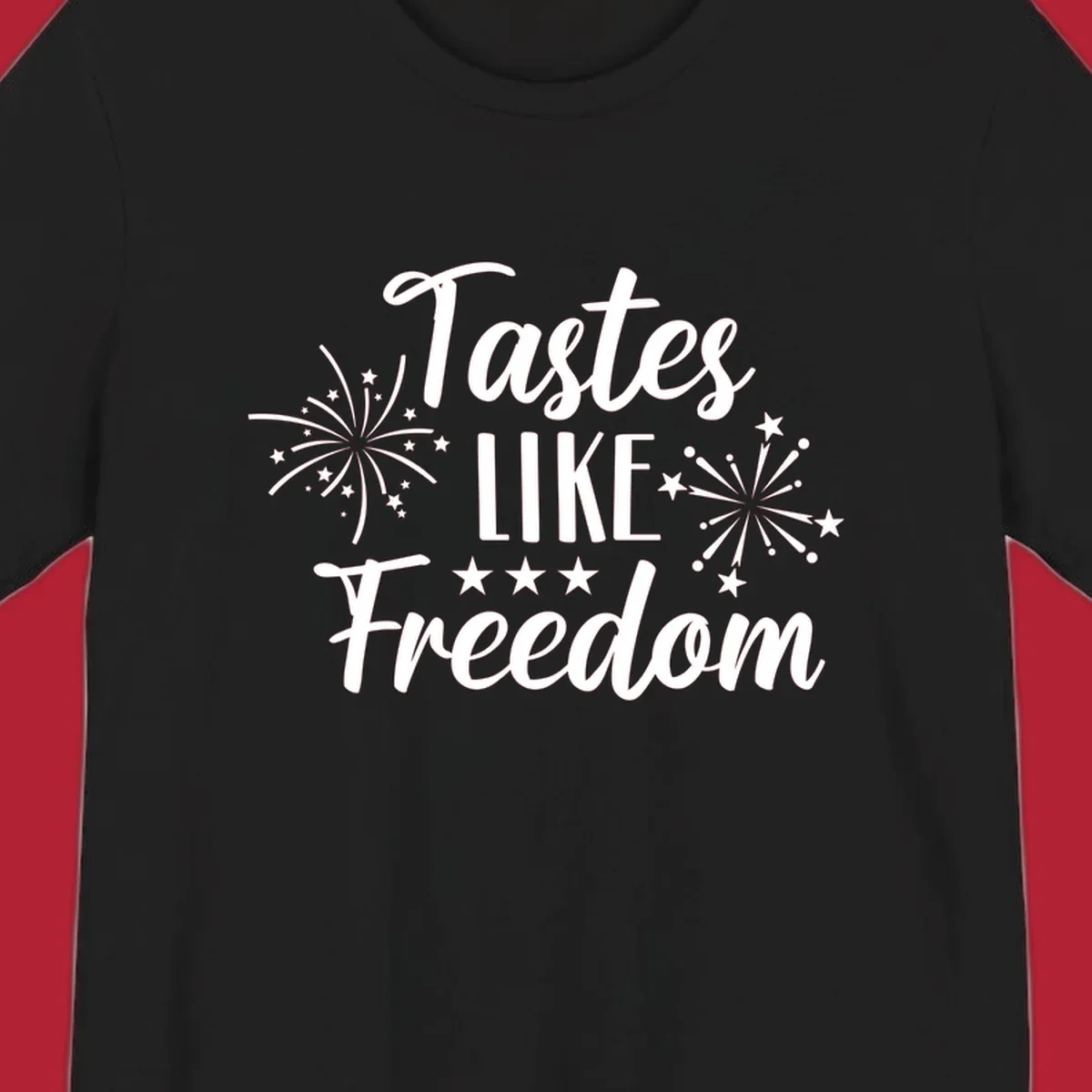 A patriotic design with the phrase 'Tastes LIKE Freedom' in script and block letters, surrounded by fireworks and stars.