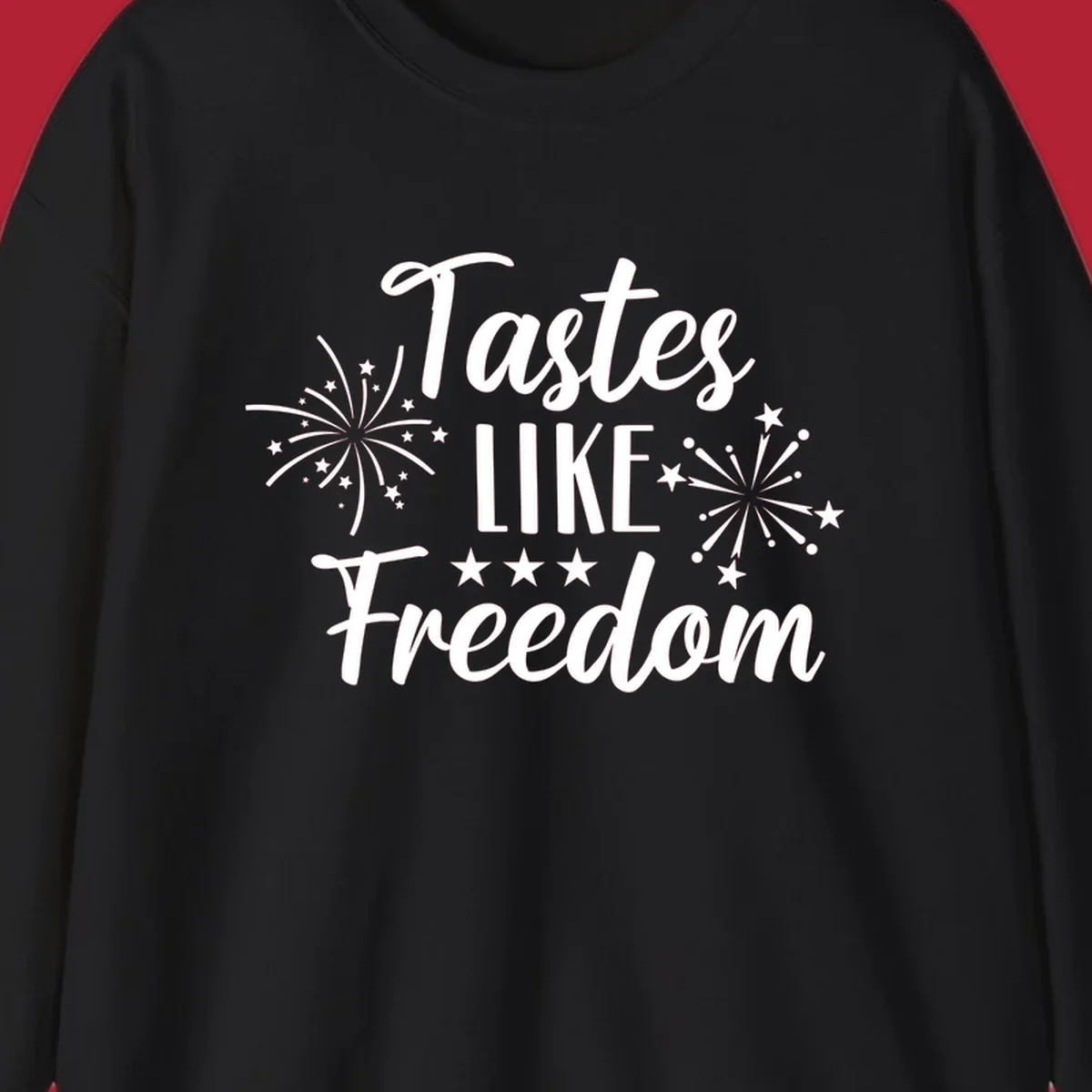 A patriotic design with the phrase 'Tastes LIKE Freedom' in script and block letters, surrounded by fireworks and stars.