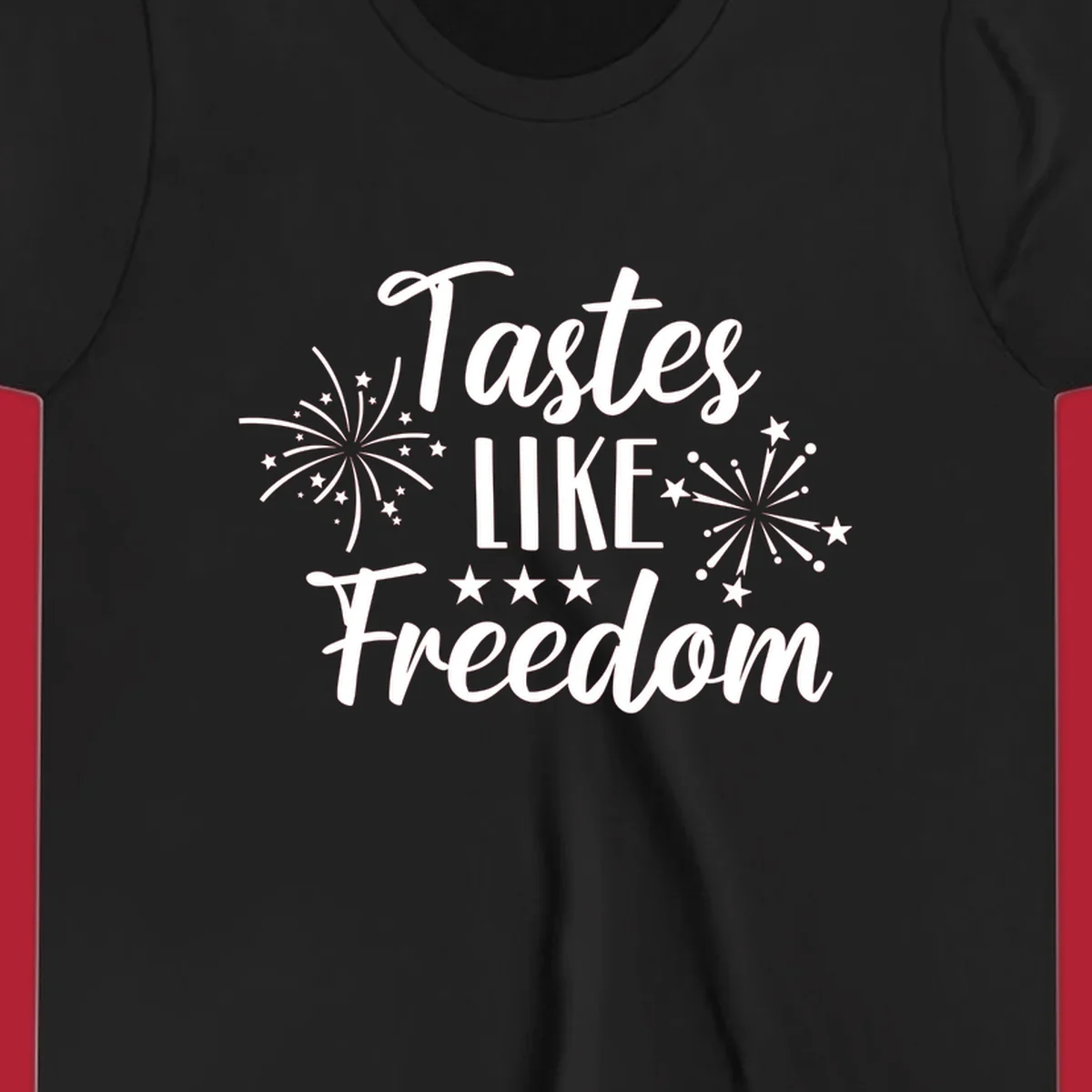 A patriotic design with the phrase 'Tastes LIKE Freedom' in script and block letters, surrounded by fireworks and stars.