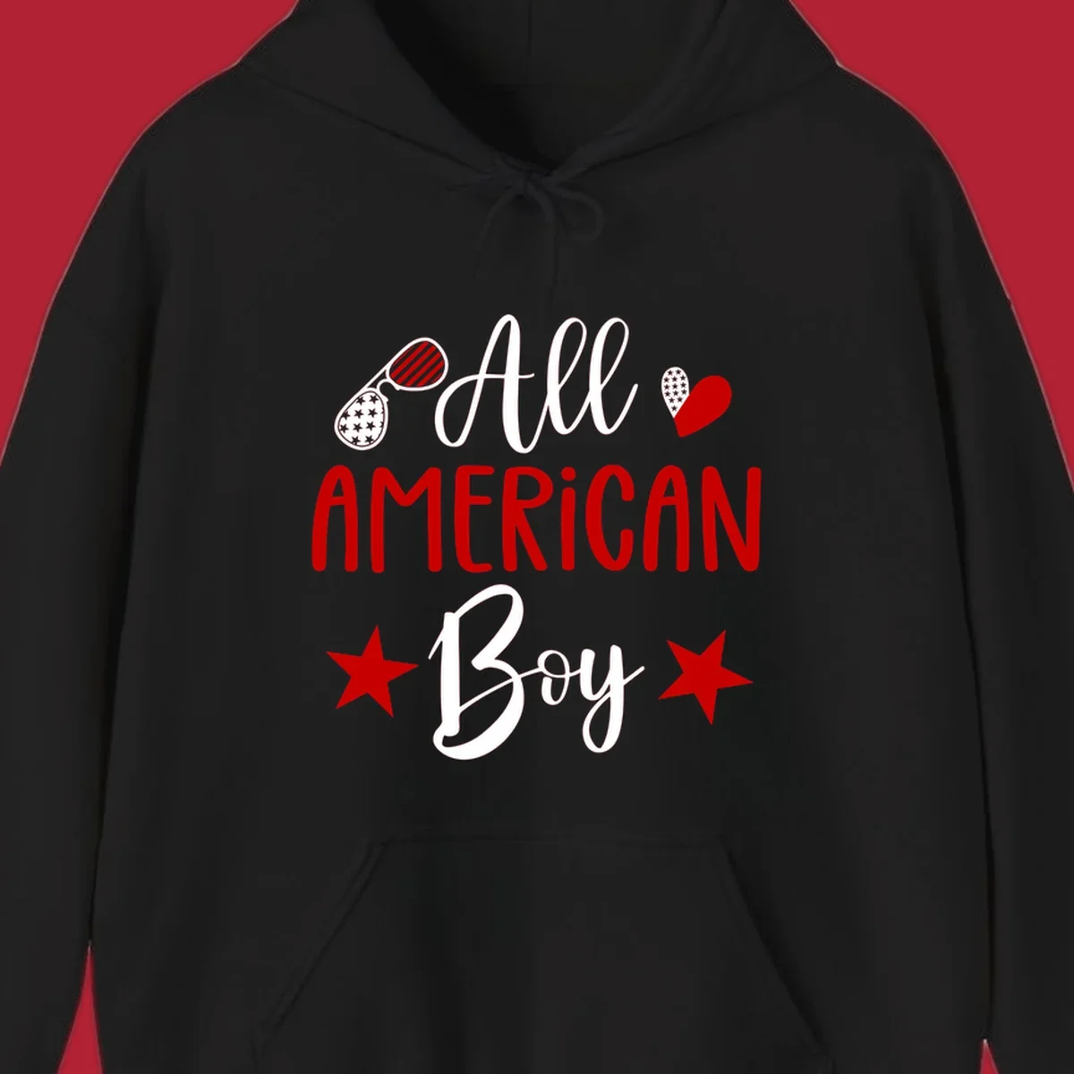 An 'All American Boy' design with patriotic sunglasses, a heart, and stars in red, white, and black.