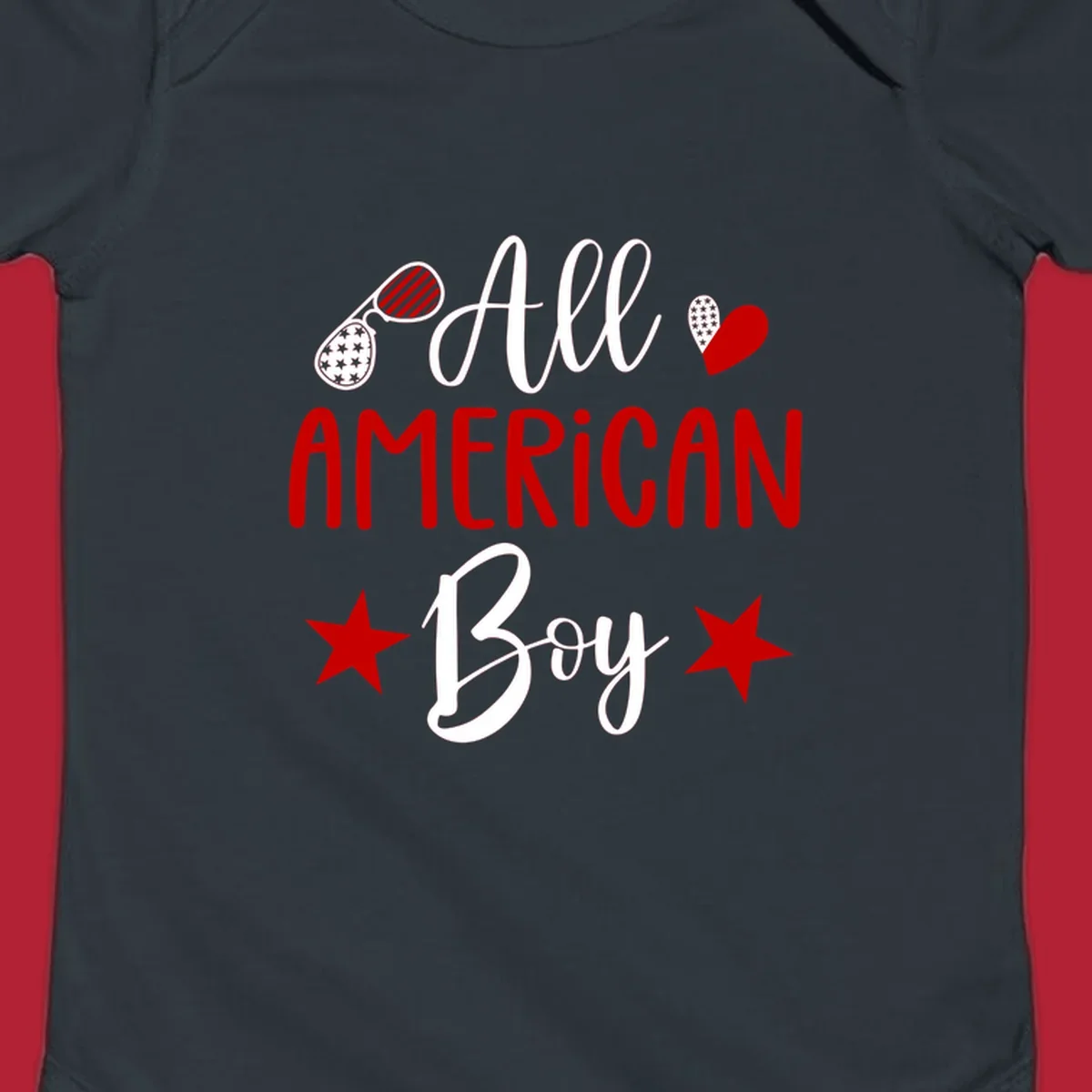 An 'All American Boy' design with patriotic sunglasses, a heart, and stars in red, white, and black.