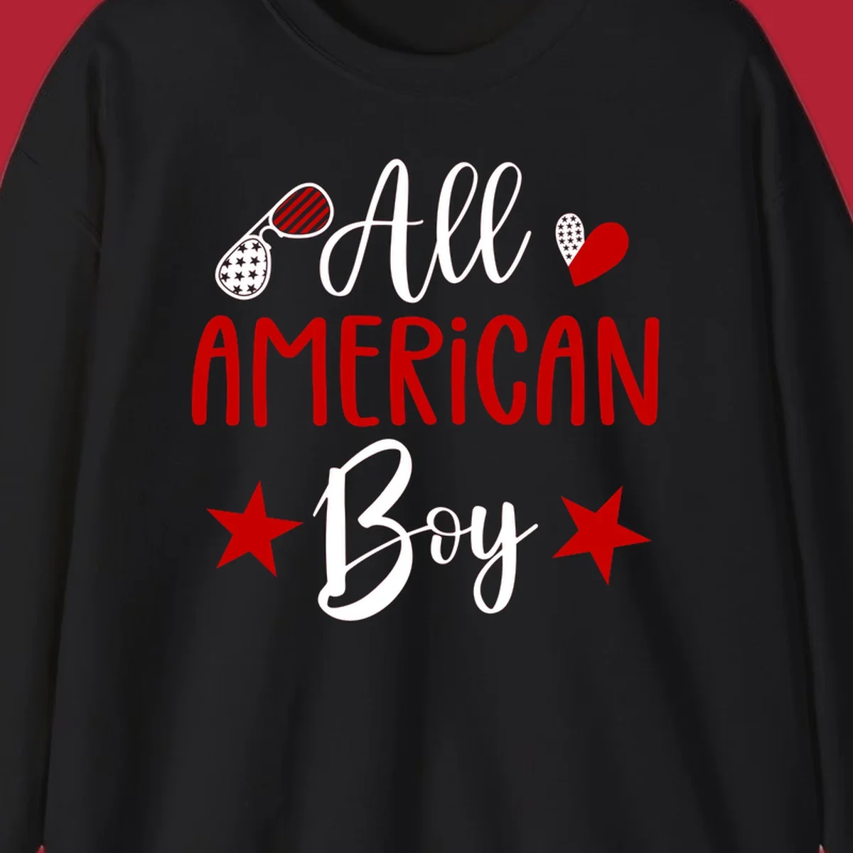 An 'All American Boy' design with patriotic sunglasses, a heart, and stars in red, white, and black.