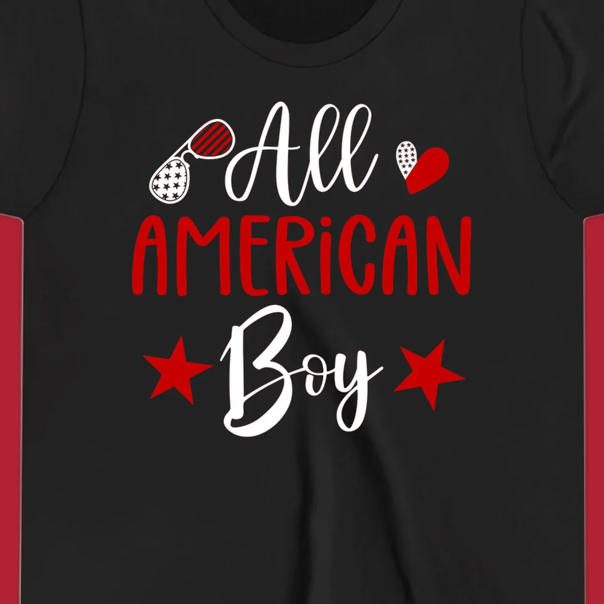 An 'All American Boy' design with patriotic sunglasses, a heart, and stars in red, white, and black.