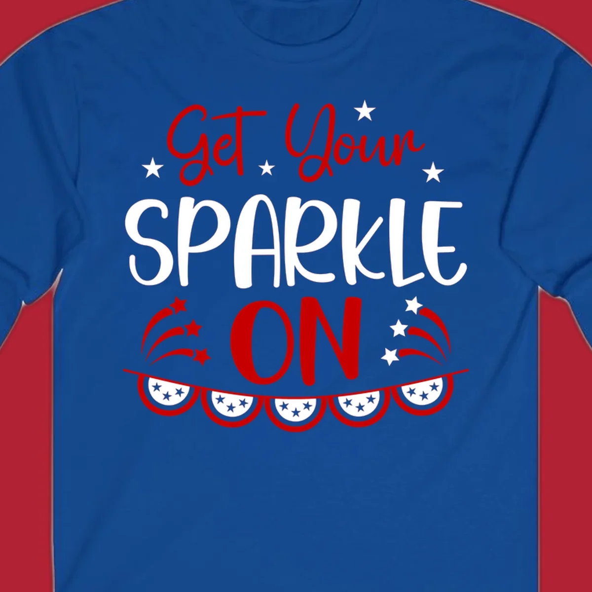 A patriotic design with the phrase 'Get Your SPARKLE ON' in red and blue, surrounded by white stars, fireworks, and bunting flags.