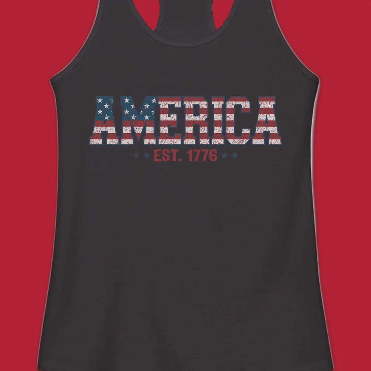 Distressed America Est. 1776 flag design with red, white, and blue flag pattern on block letters and stars.