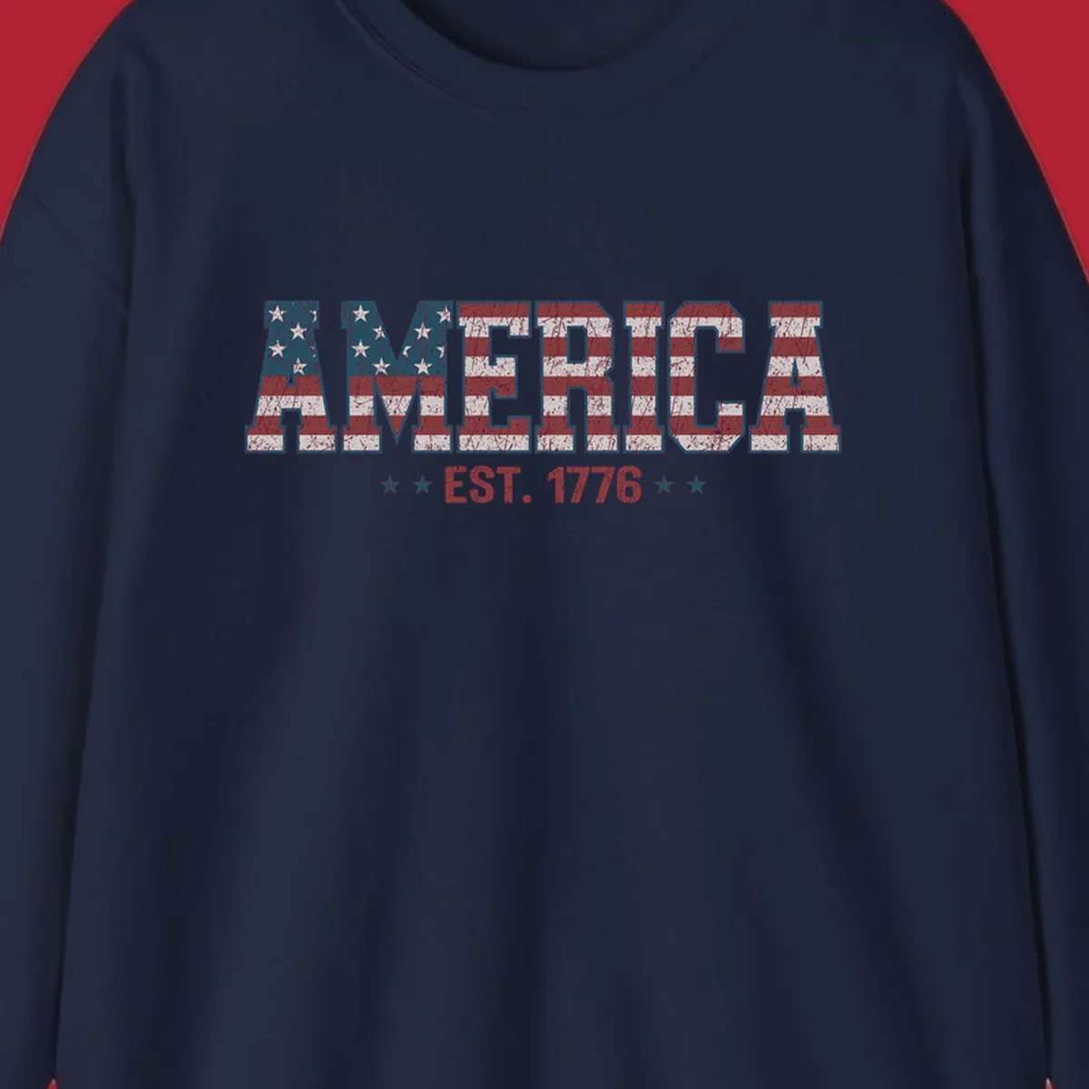 Distressed America Est. 1776 flag design with red, white, and blue flag pattern on block letters and stars.