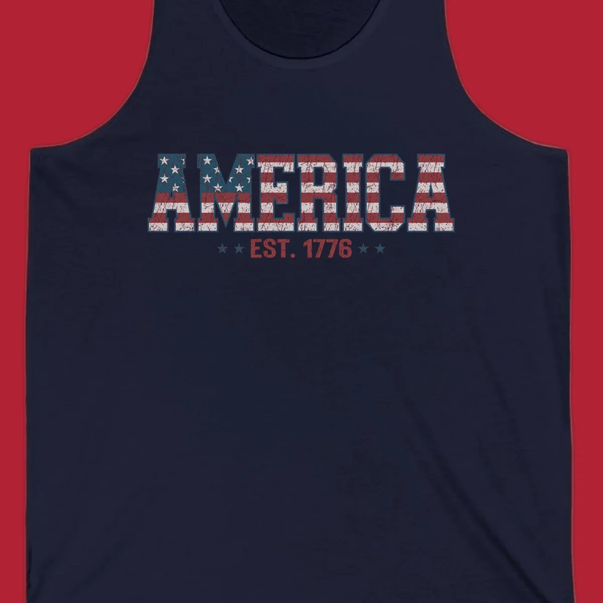 Distressed America Est. 1776 flag design with red, white, and blue flag pattern on block letters and stars.