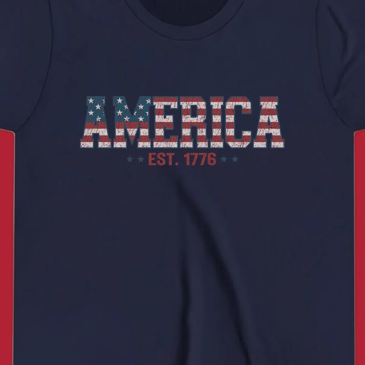Distressed America Est. 1776 flag design with red, white, and blue flag pattern on block letters and stars.