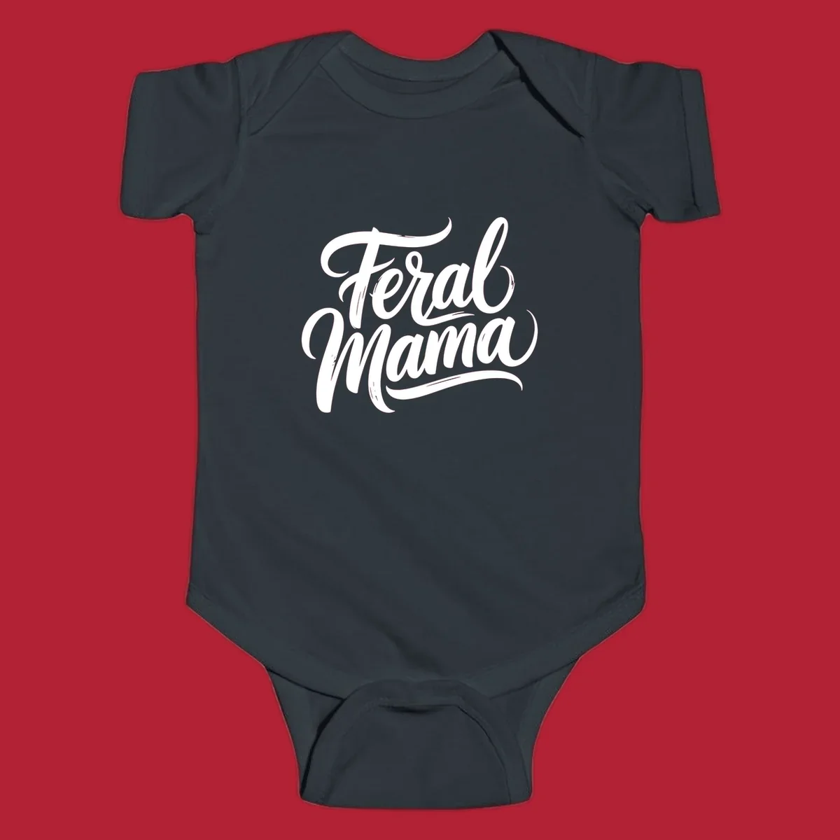 Bold black script text reading 'Feral Mama' with decorative flourishes, highlighting the feral mama script concept.